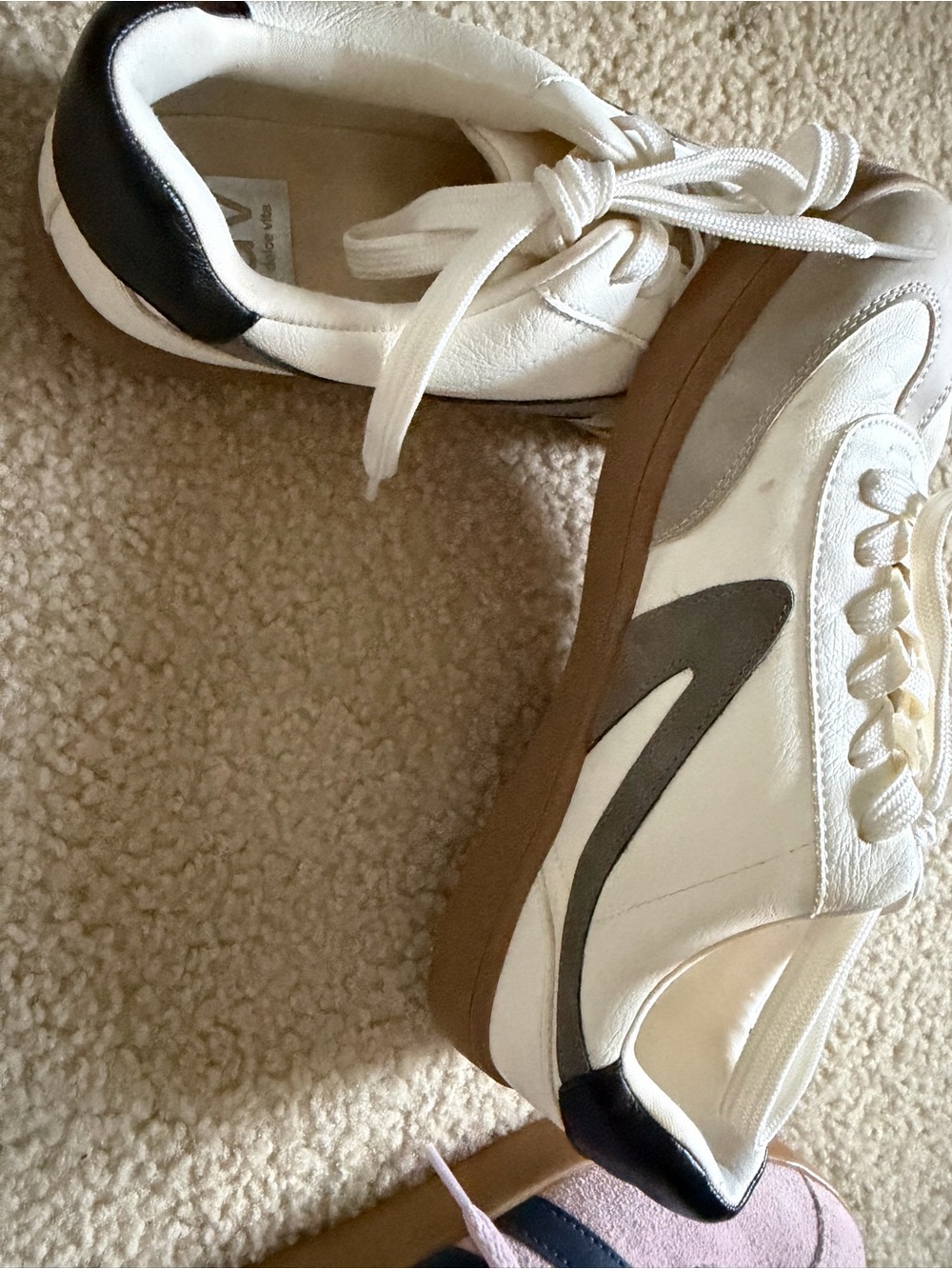 Dolce Vita Women’s White Leather Casual Sneakers with Black Heel Accent